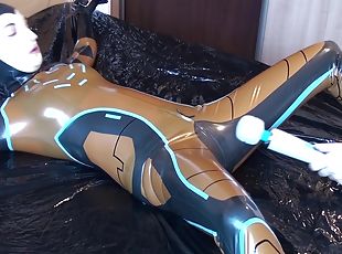 Latex Danielle Is Attached To The Bed And Masturbated With The Mass...