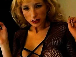 Smoking fetish blonde in black body stocking