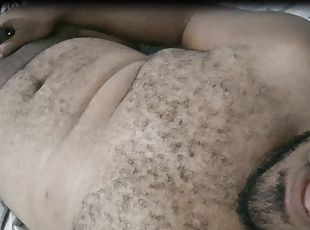 Naked guy in bed ready to cum, big hairy man with big dick touching...