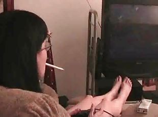 Smoking girl plays video games