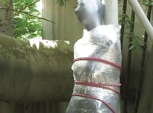 Bondaged and cocooned slave girl in the mystery garden - Full encas...