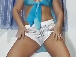 Naughty slut Mirella Delicia dancing in white beach shorts and blue...