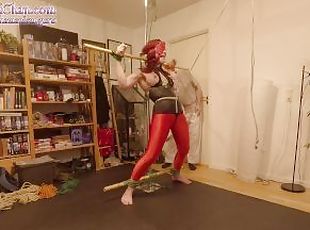 Girl in crotch rope predicament, tied in standing spread eagle and ...
