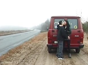 Long haired milf sucks a thick cock and gets slammed in the back of a van
