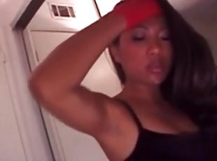 Sexy girl in red satin gloves pours milk on her tits