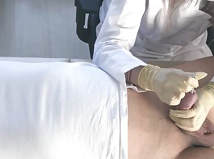 Teen Doctor In A Medical Gown And Gloves, Sounding Urethra Without ...