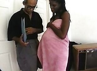Pregnant ebony girl tickles his cock and gets a tit fuck