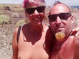 Couple Is Hiking Naked Near the Coast