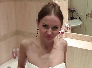 Very beautiful babe Lia taking a shower and gets filmed