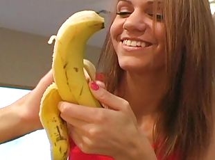 Girl Eating A Banana.