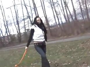 Watch a cute teen play with her dogs