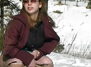 Skirt girl pissing in the snow