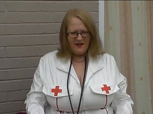 Mature in PVC nurse outfit