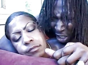 Black babe with alarge ass blows a fat black cock and gets her puss...