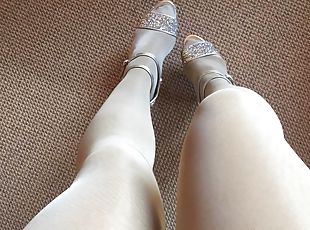 Leg tease in layerd shiny white crystal pantyhose and bright high h...