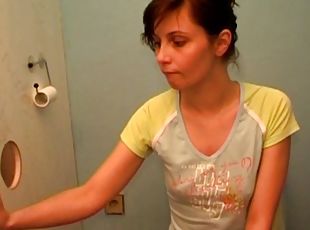 Short-haired brunette suck a dick in the toilet