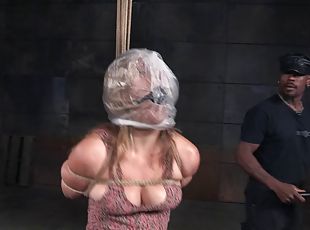 Attractive blonde is a prisoner of a black guy who loves BDSM things