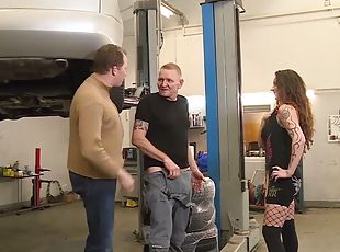 Two mechanics fucking whore in the spacious garage