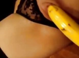 Kinky chick masturbating her shaved pussy with a banana