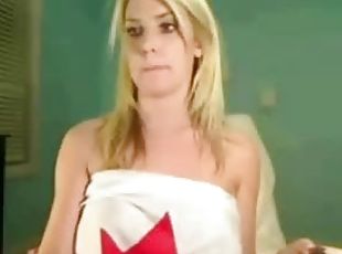 Sexy blonde bombshell having fun with a Canadian flag