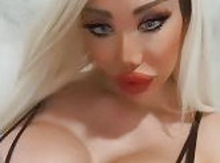Its me, Luxury Plastic Doll. I love showing off my big silicone tit...