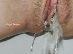 Long Massive Pissing very close up with the cute golden pee drops o...