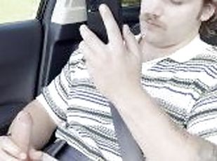 Sexy man can’t control himself and has to jerk off in the car on a roadtrip