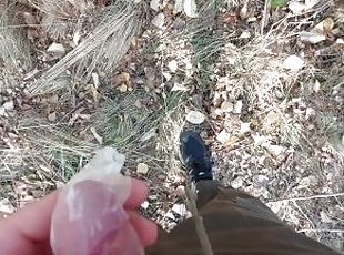 Young horny twink found a used condom in the woods, so he put his c...