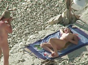 Horny Couple Shares Intimate Moments At Nudist Beach
