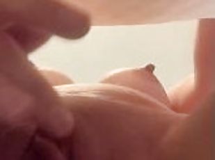 Fingering shaved pussy, tits out, close up and wet