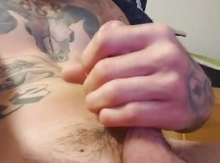 Home alone in the garage jerking my cock until I bust a load