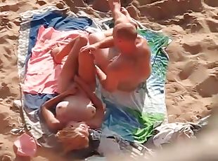 Beautiful blonde on her back for beach sex