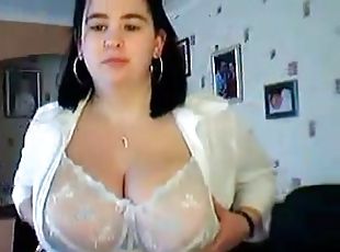 Brunette milf with huge knockers on webcam