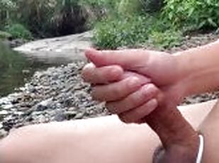 Playing cock by the public creek