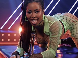 Kira Noir wearing fishnet lingerie sucking a big black cock