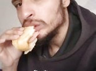 Turkish man feeding with a sandwich Jul 1