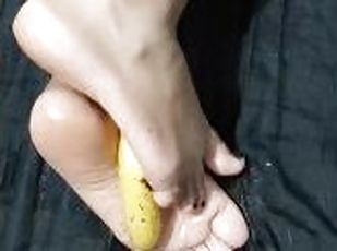 Toejob, ebony oiled soles make a footjob on a banana with this soft...