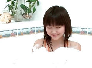 Skinny Asian girl Aliona takes a bath