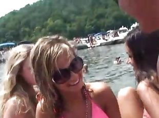 Beer drinking babes look hot at boat party