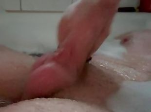 Jerking off while taking a bath