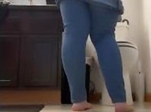 BBW stepmom MILF pissing then pulls up tight jeans and thong barefo...