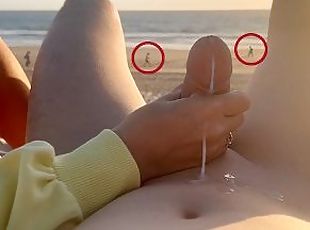 Hand job on a nude beach. We were caught jerking off at sunset near...