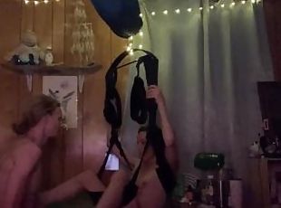Thin hot girl on sex swing has boyfriend eat her pussy and fuck her...
