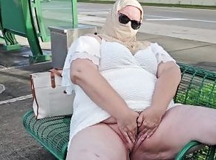 Mature hijab Milf masturbating with big dildo publicly at bus stop ...