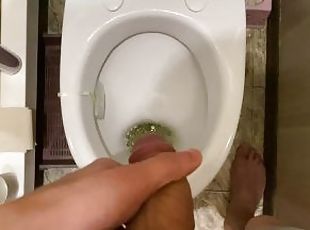 Barely managed to run, male pissing in the toilet