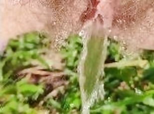 Sexy Milf Pees in the Grass. Look at her Hairy Pussy ?lose up. Outd...